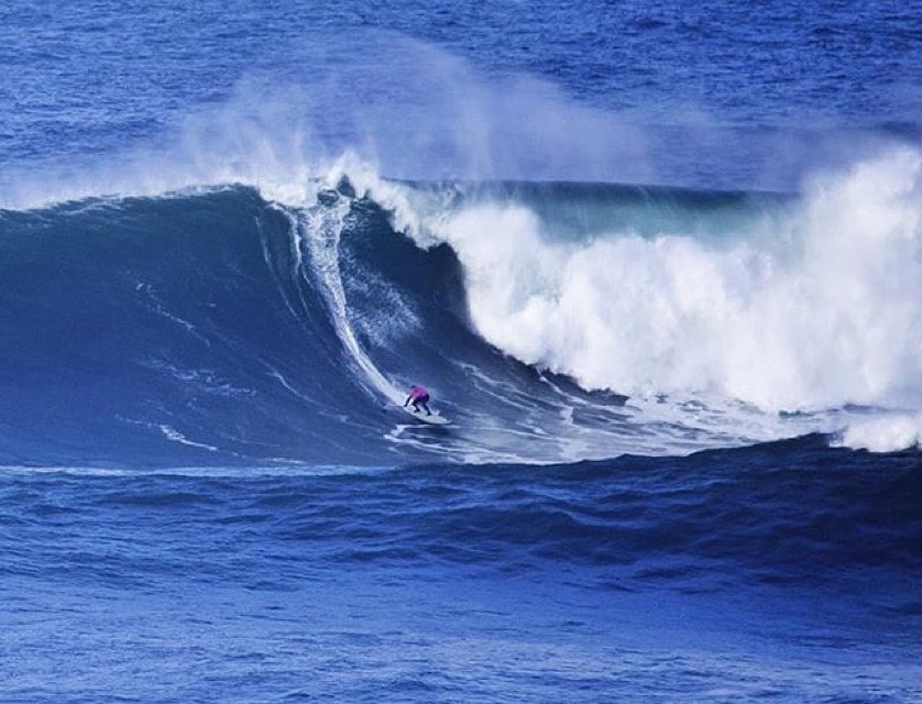 Wade surfing big waves on a SUP board at Mavericks